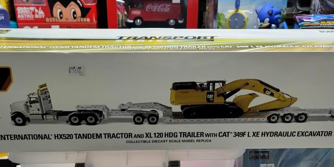 Diecast Masters 1/50 International Hx520 Tandem Tractor And Xl 120 Hdg Trailer With Cat®349F L Xe Hydraulic Excavator (85600) (49600) (C1128-44) 1